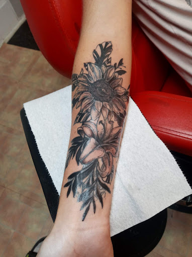 Explore zodiac tattoo ideas, creative tattoo ideas in Monticello, available at Saints Tattoos