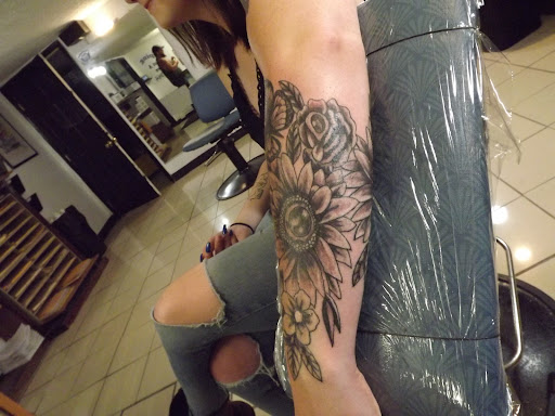 Find tattoo ideas armbands for your next unique tattoo in Princeton at Custom Dreams Tattooing and Body Piercing