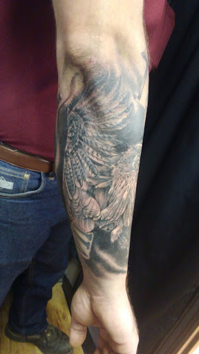 Explore soccer tattoo ideas, creative tattoo ideas in Asheboro, available at Cardinal Rose Tattoo Gallery