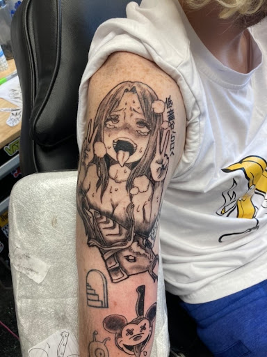 Explore full hand tattoo ideas, creative tattoo ideas in Slippery Rock, available at Dinky Dachshund Tattoo Parlor