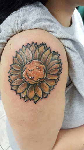 Explore blackout tattoo ideas, creative tattoo ideas in Newport, available at Mutiny Tattoo Co. LLC