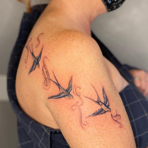 Explore family flower tattoo ideas, creative tattoo ideas in Fort Collins, available at Meadowlark Tattoo