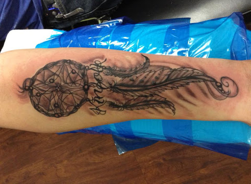 Explore greek tattoo ideas for men, creative tattoo ideas in Seymour, available at American Gypsy Tattoo Corp.