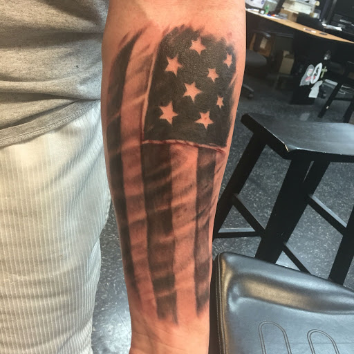 Explore pink panther tattoo ideas, creative tattoo ideas in Overland Park, available at Aftershock Tattoo Co.
