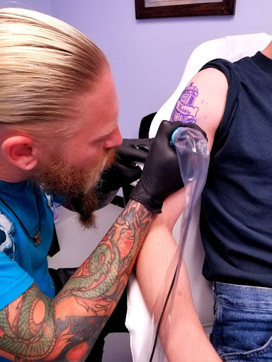 Explore name tattoo ideas on chest, creative tattoo ideas in Knoxville, available at Archangel Custom Ink Tattoo & Piercing