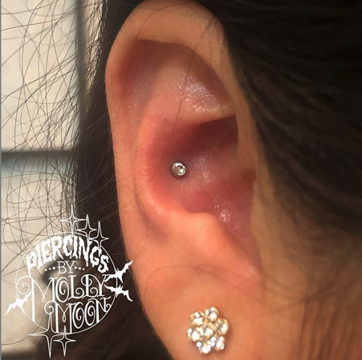 Explore lovecraft tattoo ideas, creative tattoo ideas in Oshkosh, available at Piercings by Molly Moon at 920 Tattoo and Piercing