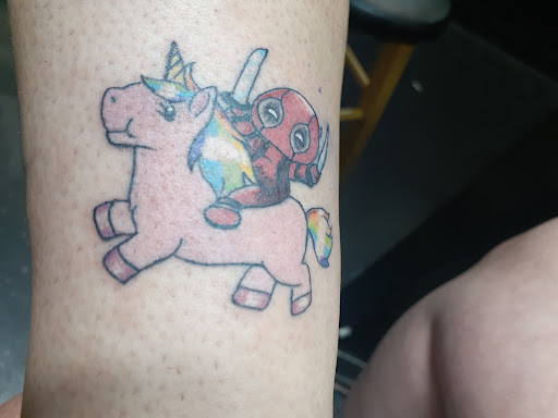 Explore leg tattoo cover up ideas for men, creative tattoo ideas in Hamilton, available at A New Part of You Tattoos and Piercings