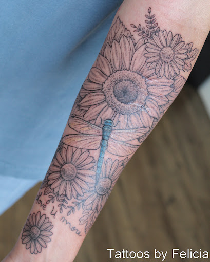 Find sun moon tattoo ideas for your next unique tattoo in Fort Myers at Tiger Lotus Tattoo and Piercing