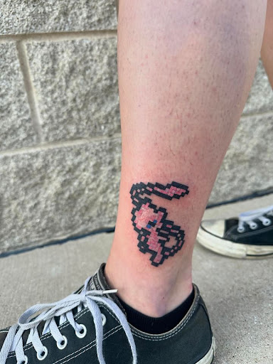 Explore e tattoo ideas, creative tattoo ideas in Crystal Lake, available at Monster Ink Tattoo & Piercing Studio
