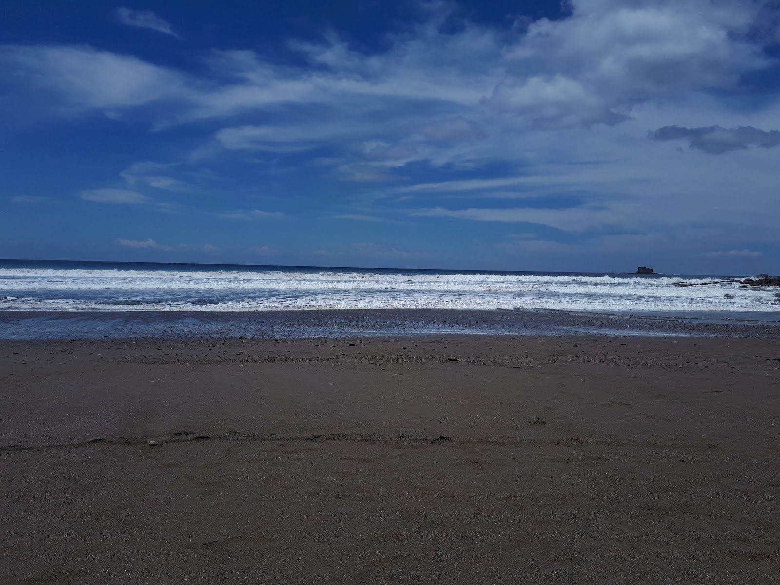 Foto de Playa Escameca - lugar popular entre los conocedores del relax
