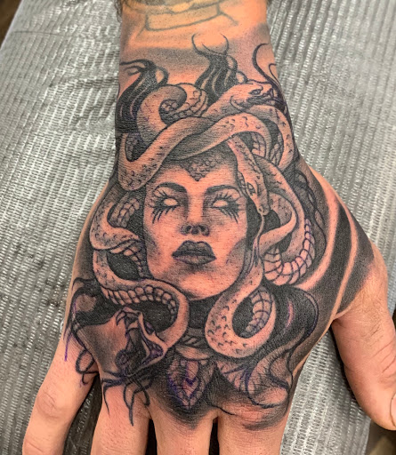 Explore wanderlust tattoo ideas, creative tattoo ideas in Fargo, available at Golden Dragon Tattoo