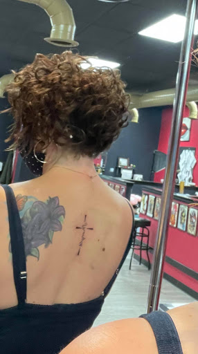 Explore red ink tattoo ideas for guys, creative tattoo ideas in Cleveland, available at True Art Tattoos, Inc