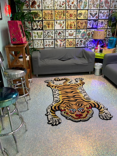 Explore black medusa tattoo ideas, creative tattoo ideas in Houston, available at The Neon Jackal Tattoo