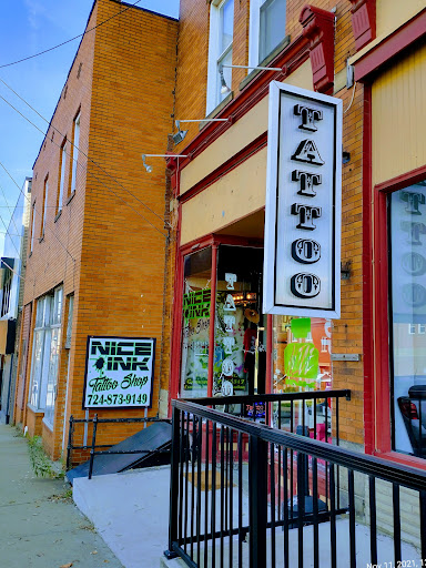 Explore slash tattoo ideas, creative tattoo ideas in Canonsburg, available at Nice Ink Tattoo Shop