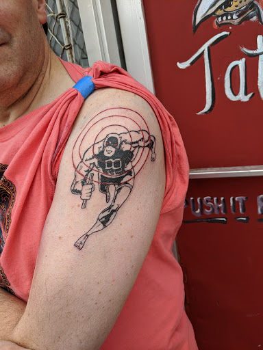 Explore tattoo ideas for firefighters, creative tattoo ideas in New Orleans, available at Catahoula Tattoo 