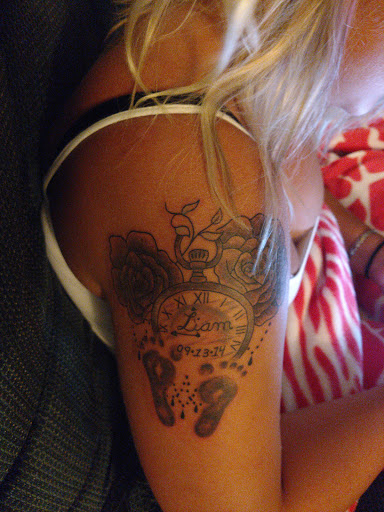 Explore tupac tattoo ideas, creative tattoo ideas in Rockford, available at Reigning Ink Tattoo Emporium