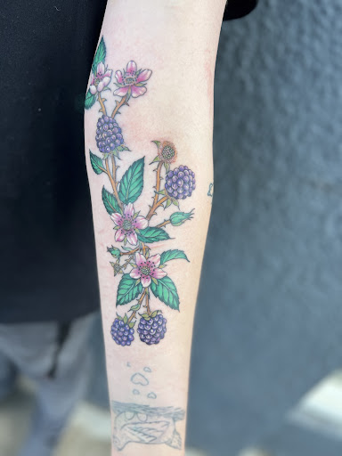 Explore blacksmith tattoo ideas, creative tattoo ideas in Cottage Grove, available at Tattoo Nouvelle