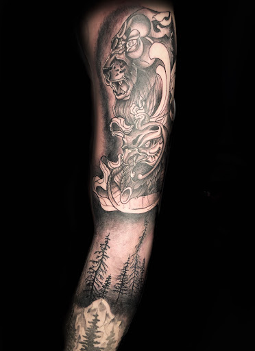 Explore cross tattoo ideas male, creative tattoo ideas in Buford, available at Wild Tribe Tattoos and Piercings