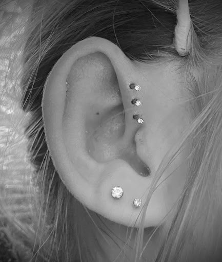 Explore symbol small tattoo ideas, creative tattoo ideas in Logan, available at Surreal Ink Tattoo & Body Piercing