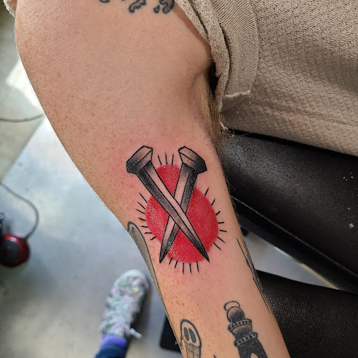 Explore hand tattoo ideas for man, creative tattoo ideas in Seymour, available at Popseys Electric Tattooing Co.