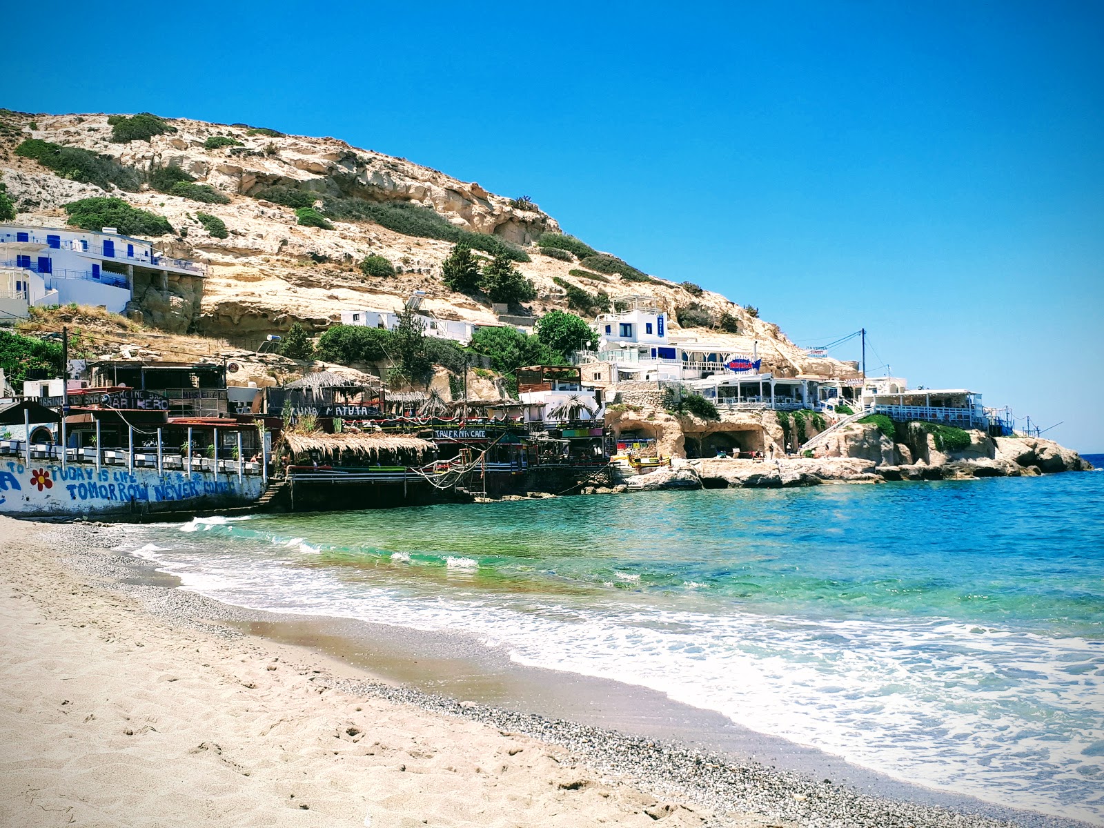 Foto av Matala Stranden och dess vackra landskap