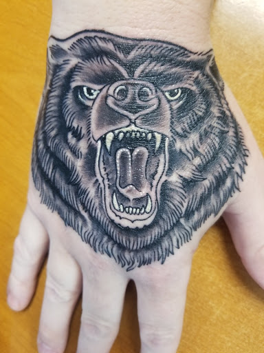 Explore pitbull tattoo ideas, creative tattoo ideas in Tarpon Springs, available at Legacy Blue Tattoo Studio and Laser Removal