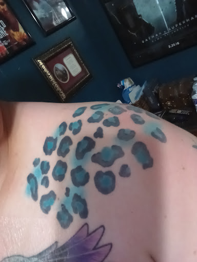 Explore back of ear tattoo ideas, creative tattoo ideas in Scottsboro, available at 5 Points Tattoo