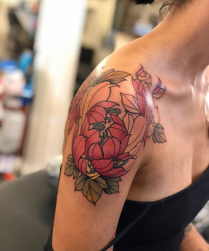 Explore back of the thigh tattoo ideas, creative tattoo ideas in Fremont, available at Inkies Tattoo Studio