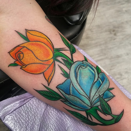 Explore collar tattoo ideas, creative tattoo ideas in Plainfield, available at Tattoo Warehouse AND Body Piercings