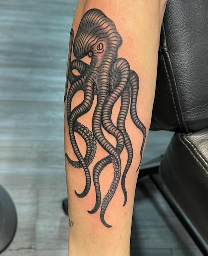 Explore street sign tattoo ideas, creative tattoo ideas in Ambler, available at Tattoo GalaxyAmbler Piercing & Custom Tattoos