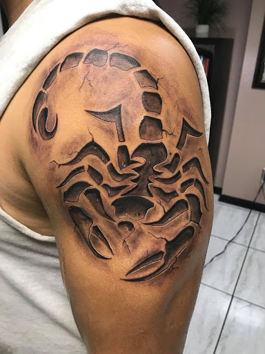 Tattoo Shop «The Lizard Lounge Tattoo Kissimmee», reviews and photos, 4519 S Orange Blossom Trail, Kissimmee, FL 34746, USA