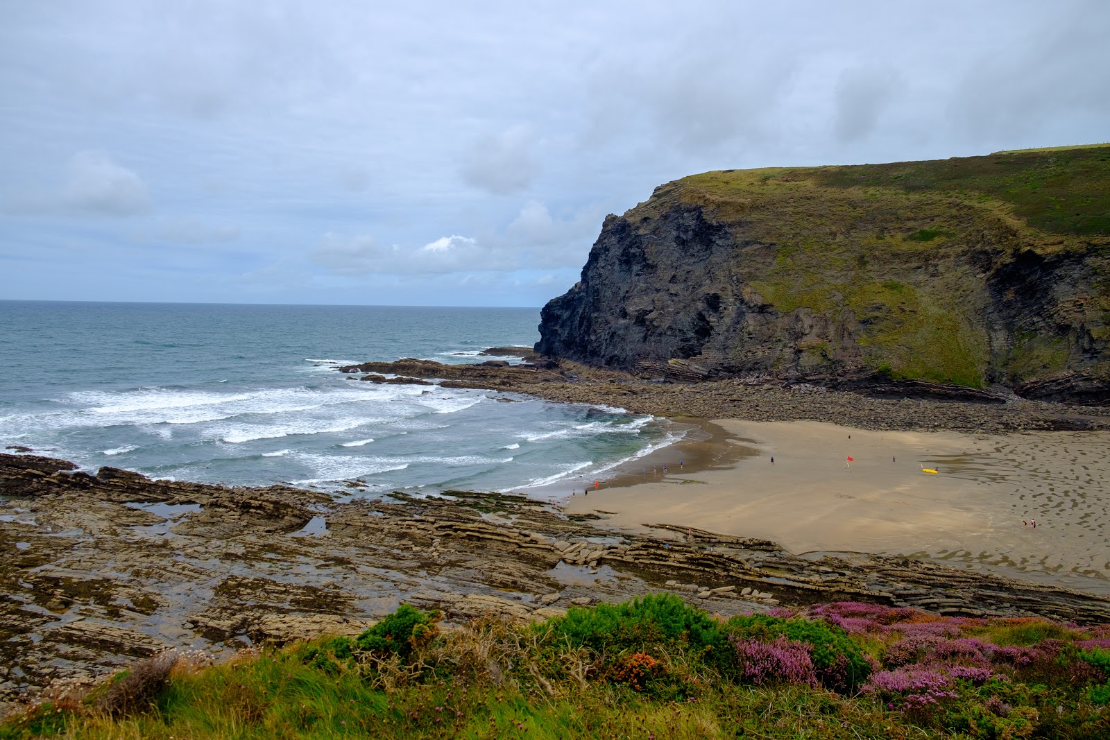 Photo of Crackington beach surrounded by mountains