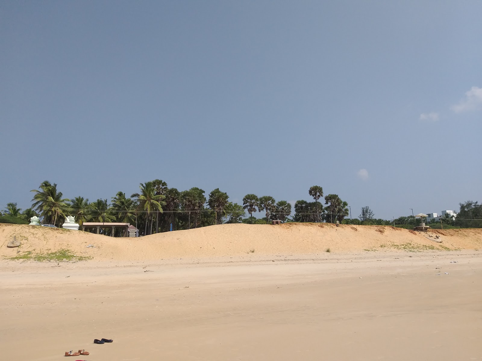 Foto di Chothavilai Beach con una superficie del acqua turchese