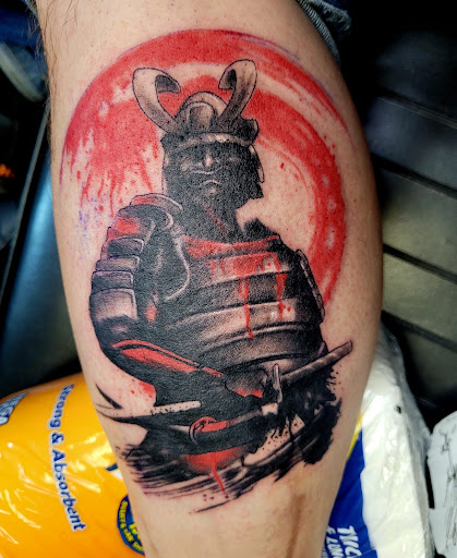Explore ski tattoo ideas, creative tattoo ideas in Tulsa, available at Renegades Top Hat Tattoos