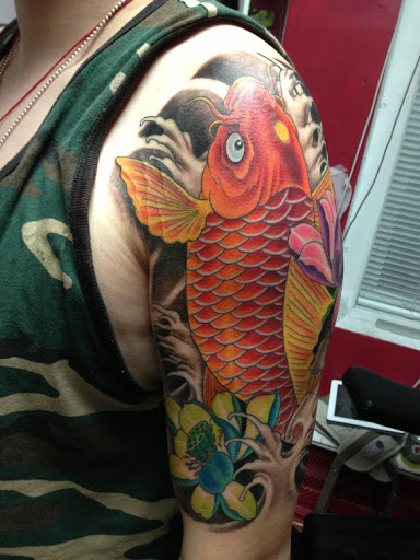 Explore grandchild tattoo ideas, creative tattoo ideas in Flushing, available at 7 Train Tattoo Studio Inc