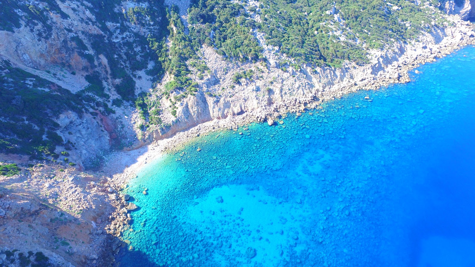 Foto van Spiaggia di San Lorenzo met turquoise puur water oppervlakte