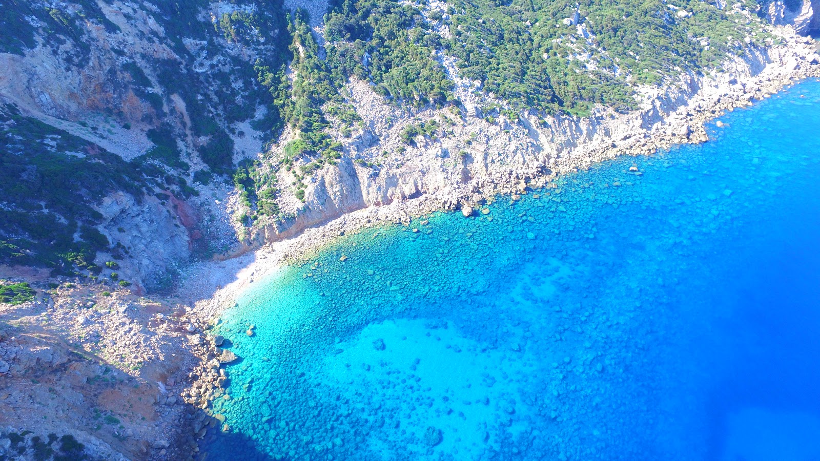 Foto di Spiaggia di San Lorenzo con una superficie del acqua cristallina