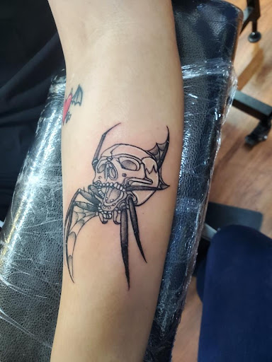 Explore roman tattoo ideas, creative tattoo ideas in Cocoa, available at Rorschach Tattoo Shop and Piercing Studio