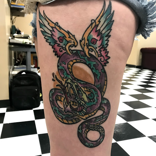 Explore wrestling tattoos ideas, creative tattoo ideas in Augusta, available at Mr. Tattoo