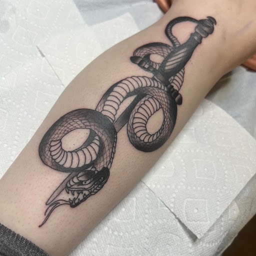 Find owl tattoo ideas for guys for your next unique tattoo in Buffalo at True Gloom Tattoo Studio