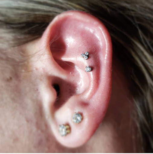 Explore hand tattoo ideas for man, creative tattoo ideas in Bloomington, available at Evil by the Needle Custom Tattoo and Piercing Studio