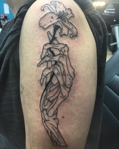 Explore hellscape battle sleeve tattoo ideas, creative tattoo ideas in Huntsville, available at Blessed Ink