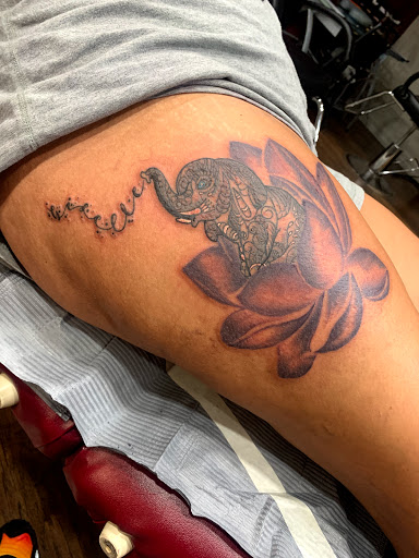 Explore elephant tattoo ideas for females, creative tattoo ideas in Cape Coral, available at UNRIVALED INK