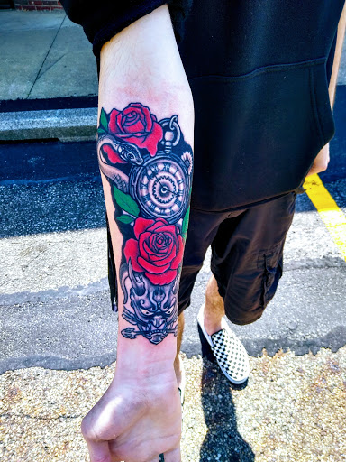 Explore blue rose tattoo ideas, creative tattoo ideas in Northfield, available at Signature Tattoo and Supplies