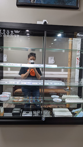 Explore black rose tattoo cover up ideas, creative tattoo ideas in Springfield, available at Newage Tattoos and Body Piercings