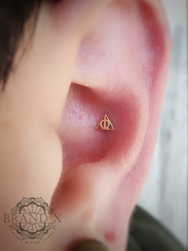 Explore women's tattoo ideas, creative tattoo ideas in Longview, available at Brand X Piercing & Fine Jewelry