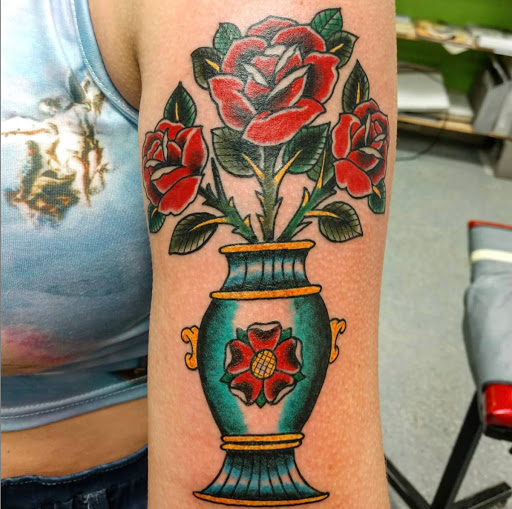 Explore swiss tattoo ideas, creative tattoo ideas in League City, available at Zen Body Art & Adornment Tattoo Shop