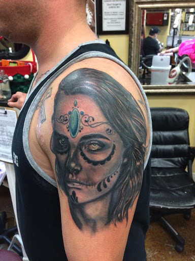 Find cute cat tattoo ideas for your next unique tattoo in Chapel Hill at Golden Falcon Tattoo and Piercing