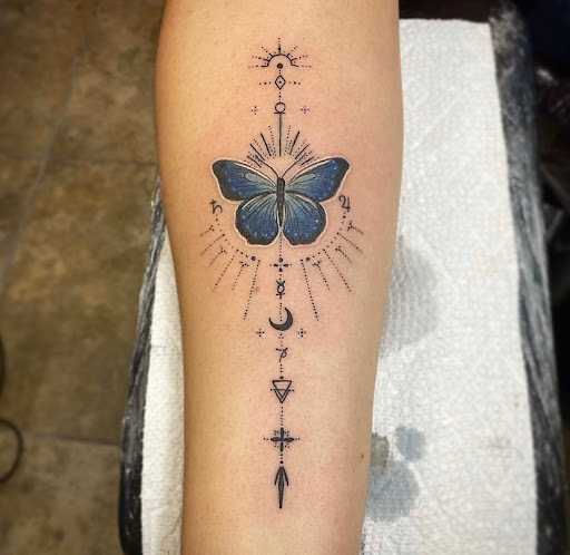Explore dragonfly flower tattoo ideas, creative tattoo ideas in Fort Myers, available at Loyal 2 The Coil Tattoos & Piercings (Edison Mall Location Entrance F)