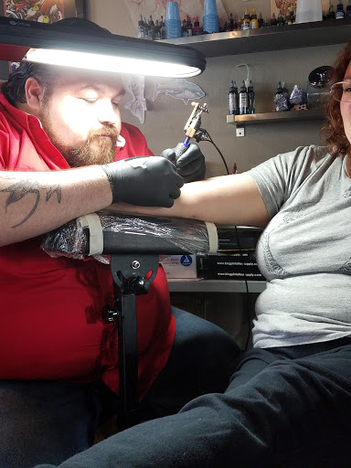 Explore unconditional love symbol tattoo ideas, creative tattoo ideas in Auburn, available at Action Tattoo